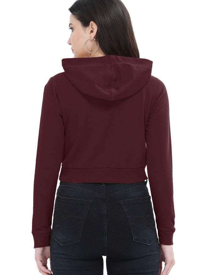 Back view of black cropped hoodie showing Derby rib hem and cuffs