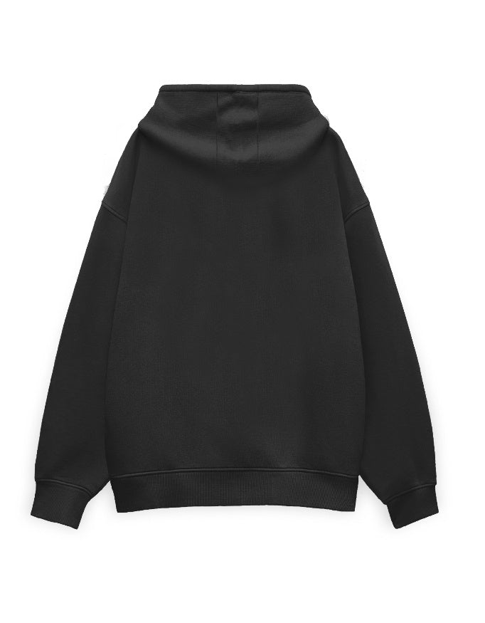 Back view of white oversized hoodie showing boxy fit and dropped shoulders