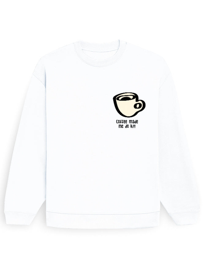 White oversized sweatshirt with small chest-print coffee cup graphic and 'coffee made me do it!!!' text