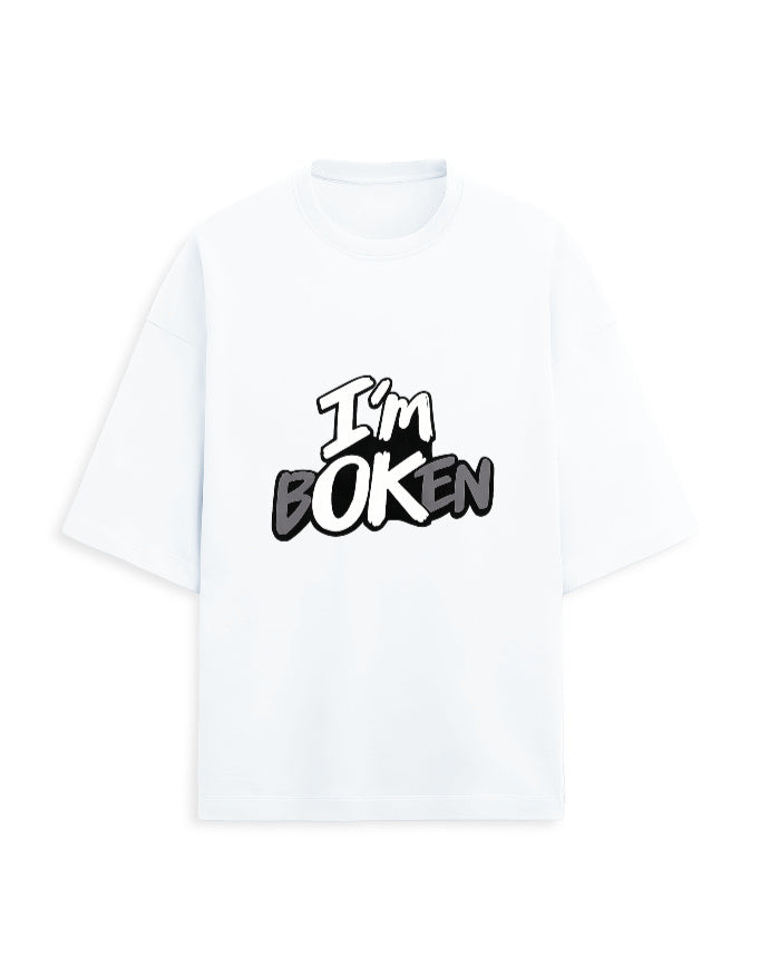 White oversized terry tee front view with black and grey "I'm bOKEN" graffiti-style chest print