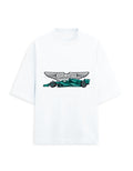 White oversized terry tee with a racing car graphic and winged emblem print on the chest, front view