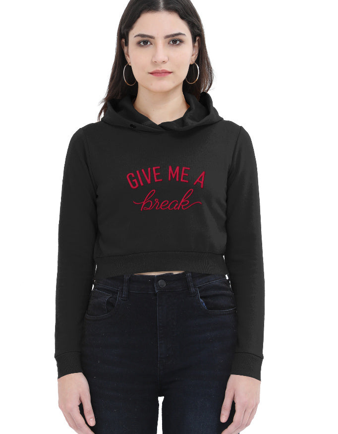 Front view of black cropped hoodie for women with red 'Give Me A Break' script graphic on the front