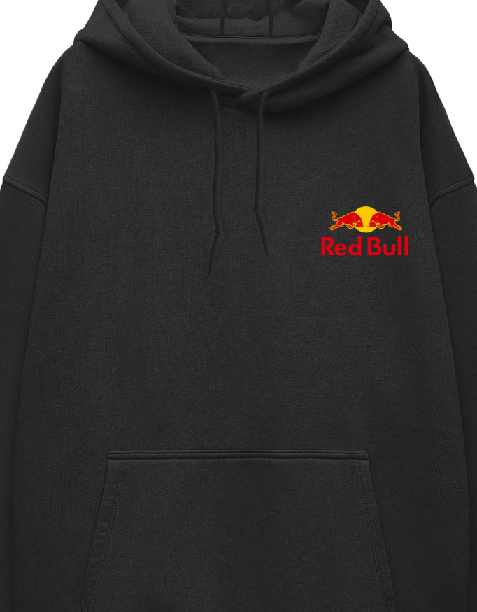 A small red-and-yellow bull emblem and wordmark logo printed on the left chest of a white unisex oversized hoodie.